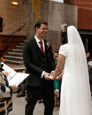 charcoal-three-piece-suit-white-shirt-textured-orange-tie