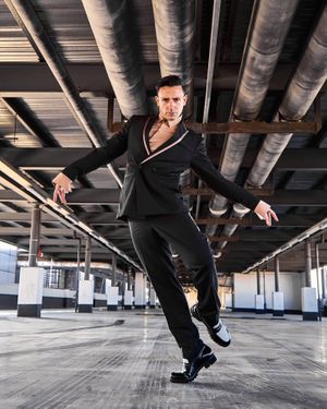 Black Double-Breasted Suit with Beige Shirt and Contrast Lapels