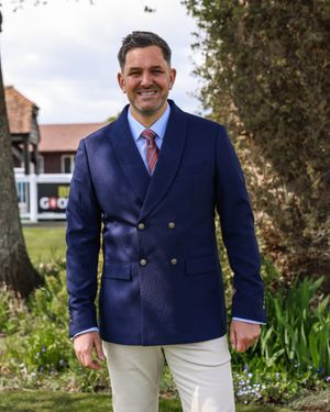 Navy Double-Breasted Blazer with Cream Trousers