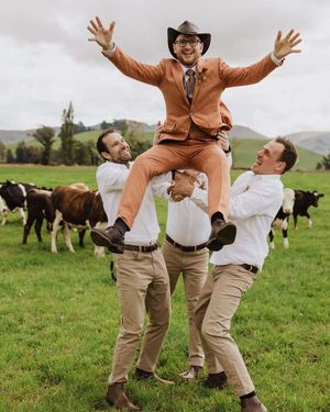 Terracotta Suit with Brown Tie and Cowboy Hat