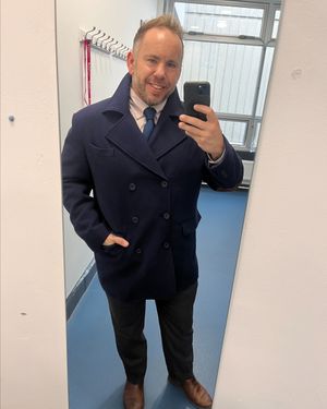 navy-peacoat-striped-shirt-black-trousers