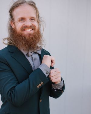 forest-green-suit-grey-shirt-bow-tie