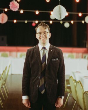 chocolate-corduroy-blazer-striped-tie-pocket-square