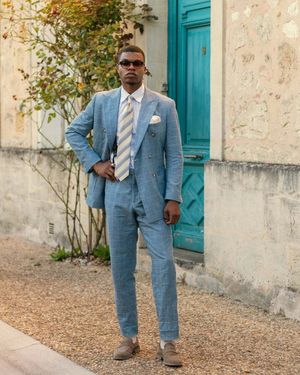 light-blue-checked-suit-beige-loafers-striped-tie