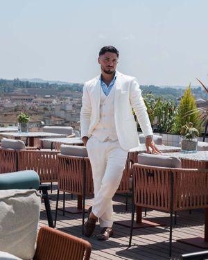 Ivory Three-Piece Suit with Light Blue Shirt