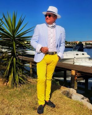 Striped Seersucker Blazer with Yellow Trousers and Loafers