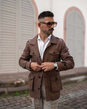 Brown Safari Jacket with White Shirt and Beige Checked Trousers