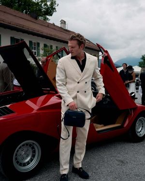 ivory-double-breasted-suit-black-shirt-loafers