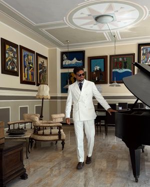 White Double-Breasted Suit with Patterned Tie