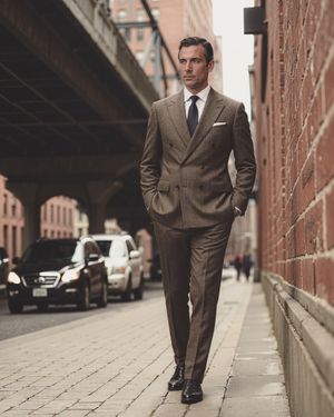 Brown Double-Breasted Suit with Blue Tie