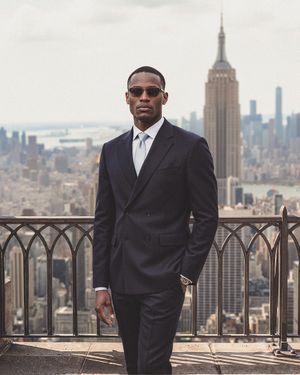 Navy Double-Breasted Suit with Light Grey Tie