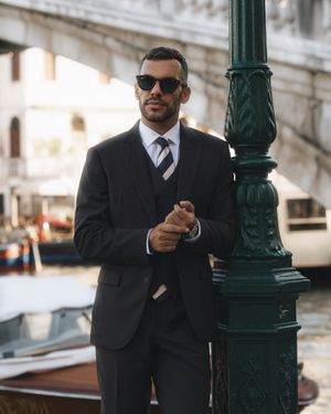 intense-brown-three-piece-suit-striped-tie