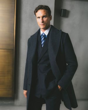 coat-pinstriped-suit-blue-tie
