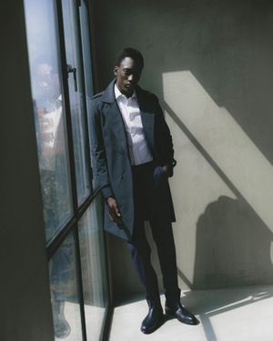 Dark Coat with Striped Shirt and Pants