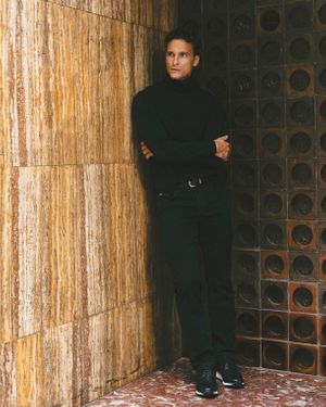 Black Turtleneck Sweater with Dark Trousers