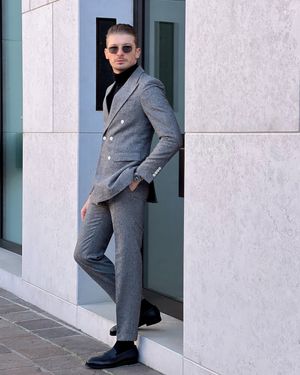Grey Double-Breasted Suit with Black Turtleneck and Black Loafers