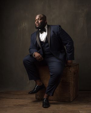 Navy Tuxedo Suit with White Dress Shirt and Black Bow Tie