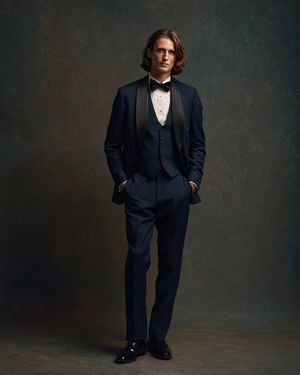 Navy Three-Piece Tuxedo with Satin Lapels and Bow Tie