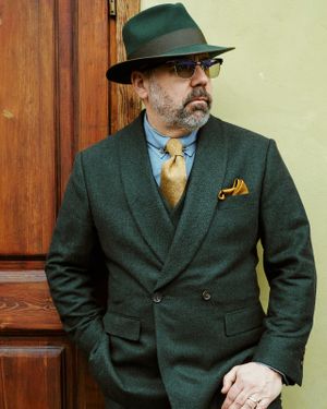 forest-green-double-breasted-suit-light-blue-shirt