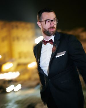 black-tuxedo-suit-red-bow-tie