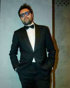 Black Tuxedo Suit with White Dress Shirt and Bow Tie
