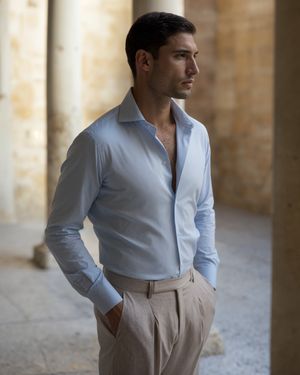 blue-shirt-beige-trousers