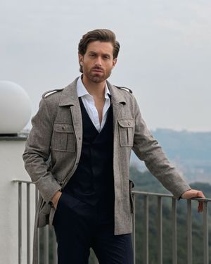 Grey Field Jacket with Navy Three-Piece Suit