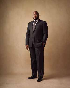 Dark Gray Pinstripe Suit with Patterned Tie
