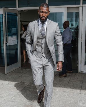 Light Grey Three-Piece Suit with Patterned Tie