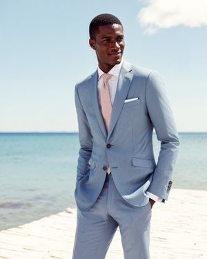 Light Blue Suit with Peach Tie