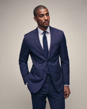 navy-suit-striped-shirt-navy-tie