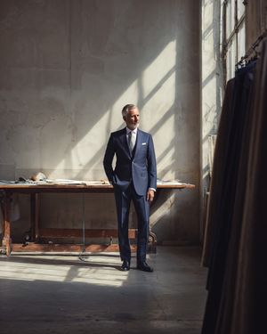 Navy Suit with White Shirt and Light Tie