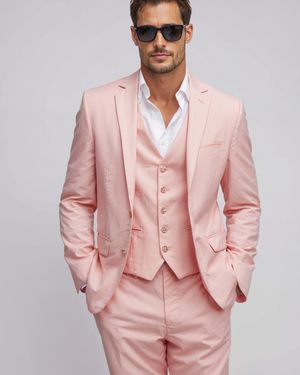 Pink Three-Piece Suit with White Open-Collar Shirt