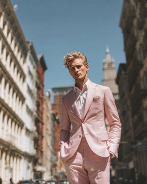 Pink Linen Suit with White Open-Collar Shirt