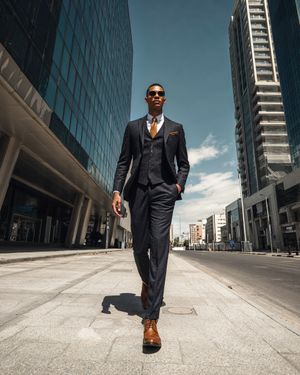 Charcoal Three-Piece Suit with Gold Tie