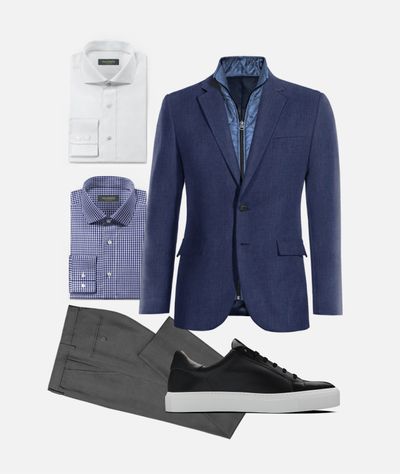 Blue jacket, gray trousers and black sneakers