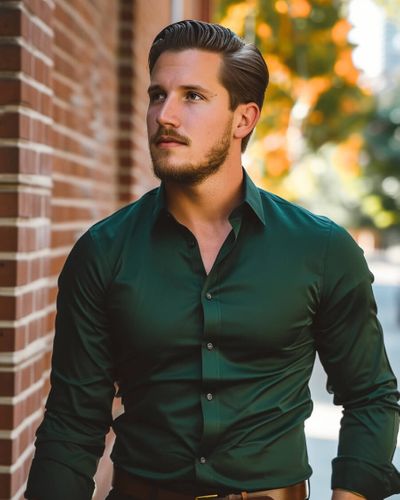 Man in green button up shirt and black pants standing on rocky road during  daytime photo – Free Gombak Image on Unsplash